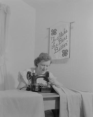 Woman demonstrating sewing